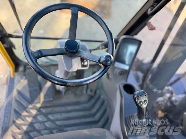 Volvo EW 140 C حفارات بعجل