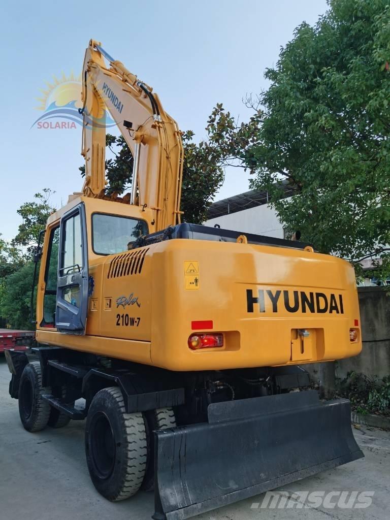 Hyundai robex 210w-7 حفارات بعجل