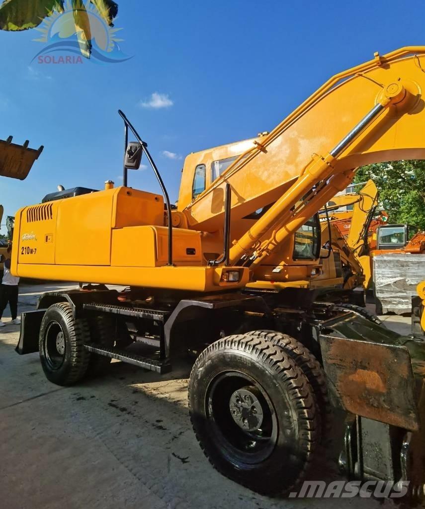 Hyundai robex 210w-7 حفارات بعجل