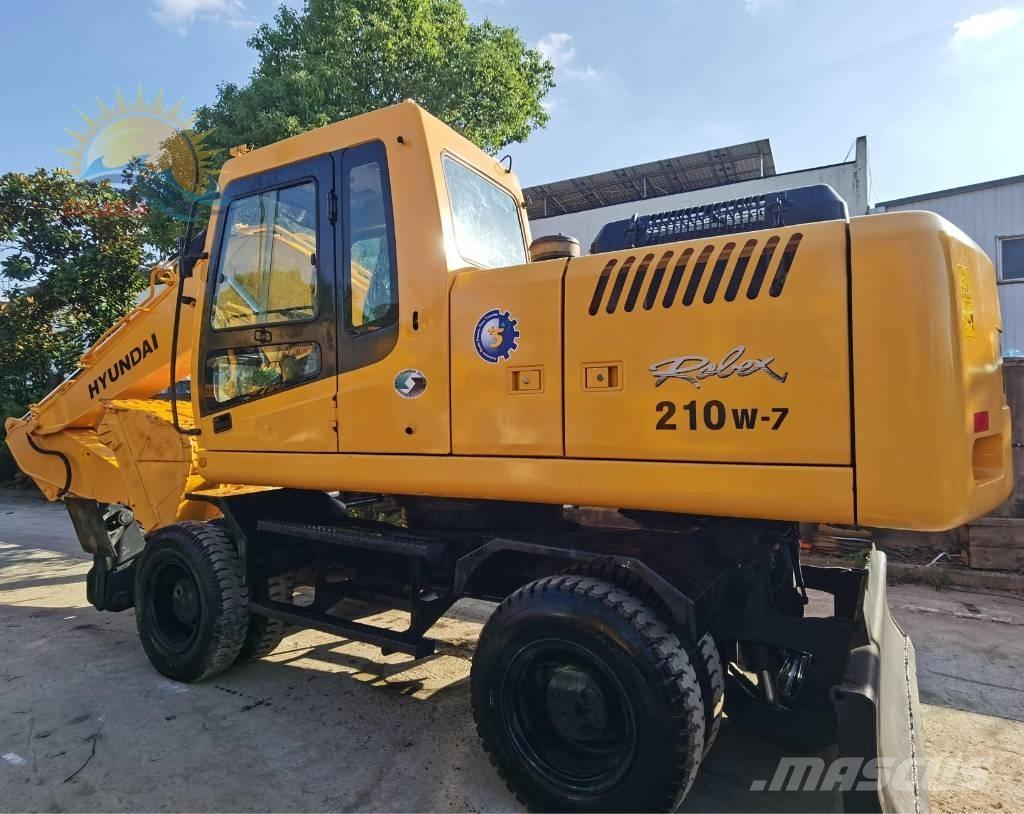 Hyundai robex 210w-7 حفارات بعجل