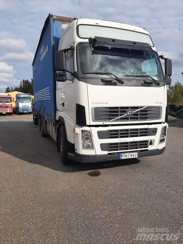 Volvo FH 12 شاحنات بغطاء جانبي