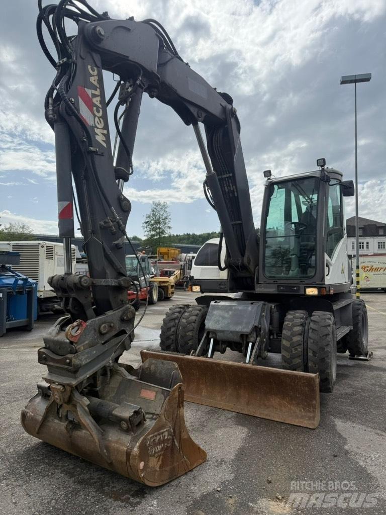 Mecalac 714 MW حفارات بعجل
