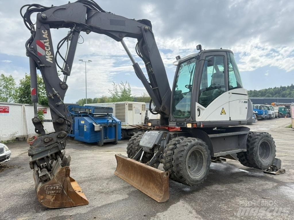 Mecalac 714 MW حفارات بعجل