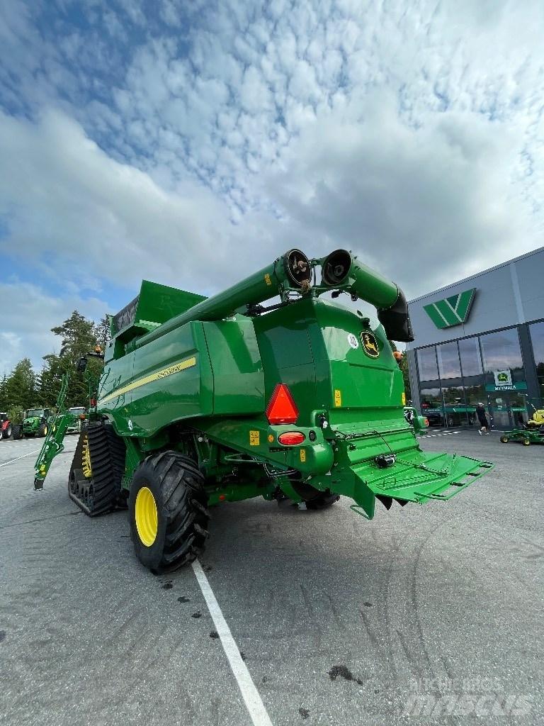 John Deere T670 i حصادات