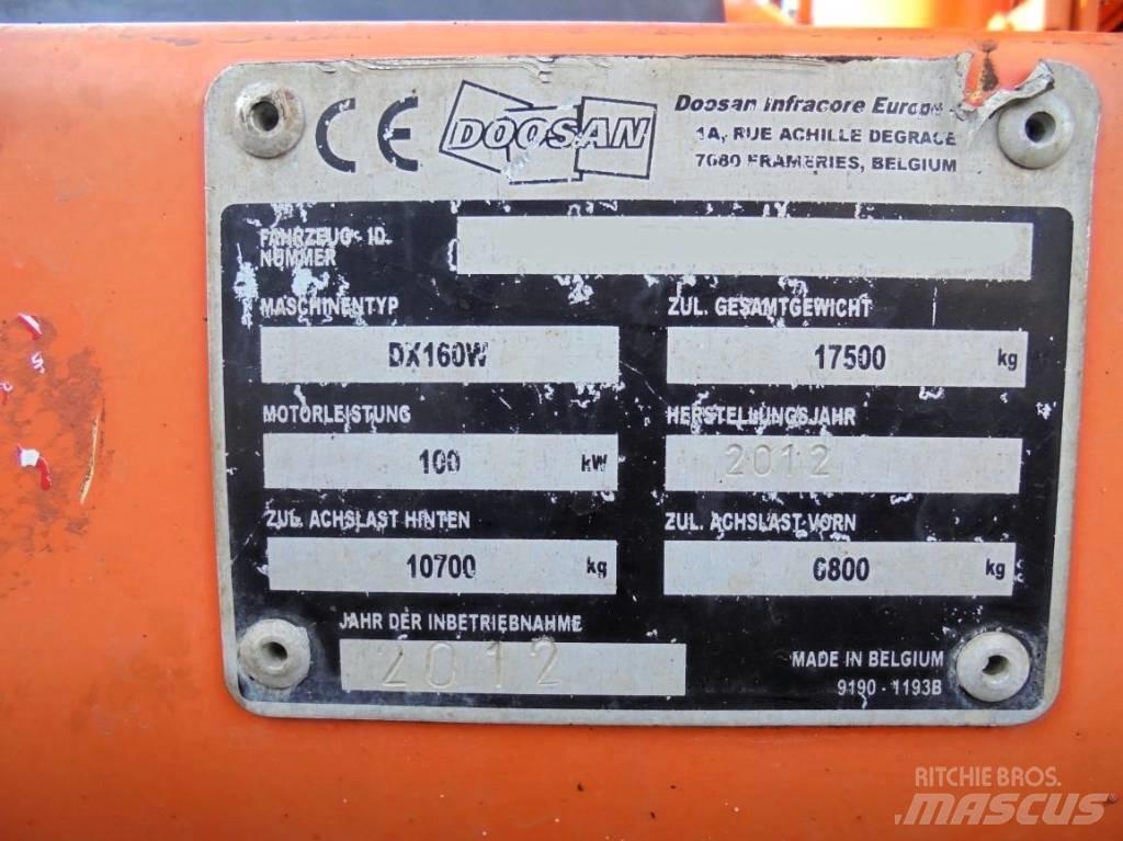 Doosan DX 160 W حفارات بعجل