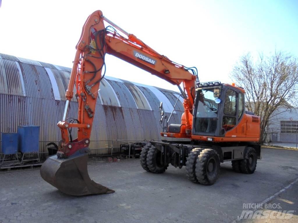 Doosan DX 160 W حفارات بعجل