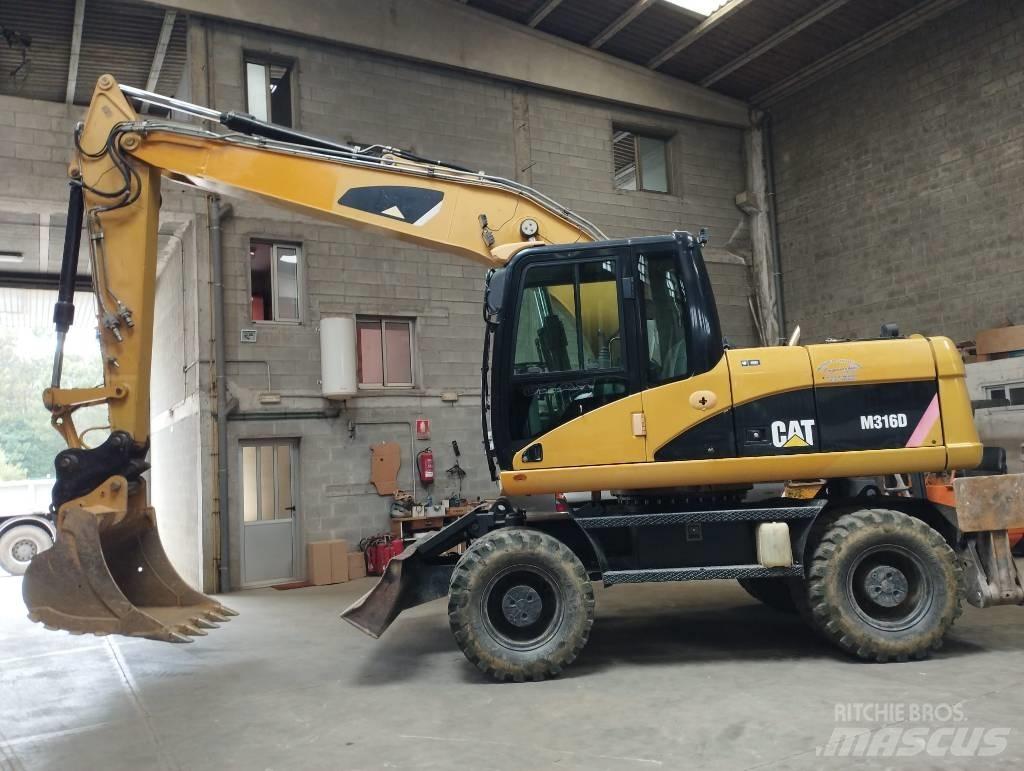 CAT M 316 D حفارات بعجل