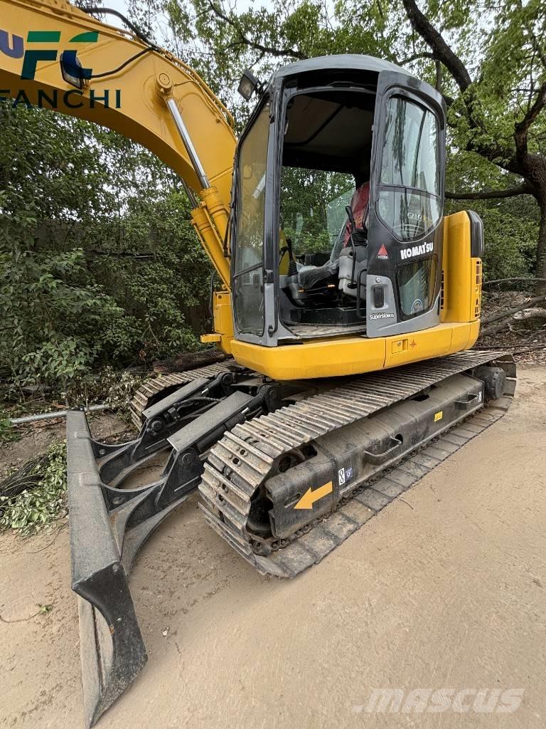 Komatsu PC128US حفارات زحافة
