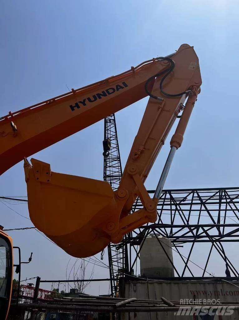 Hyundai 210w-9 حفارات بعجل