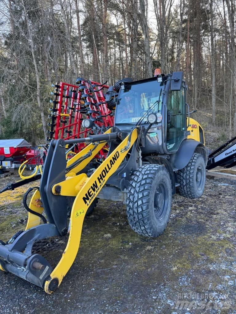 New Holland W 80 C لوادر بعجل