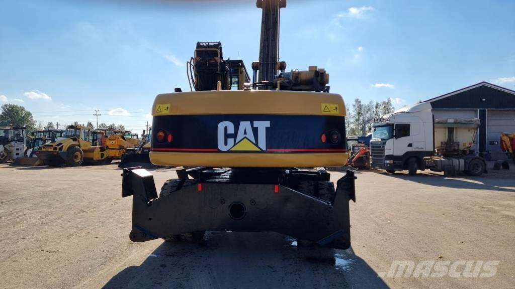 CAT M 322 C MH مناولات المخلفات / مناولات صناعية