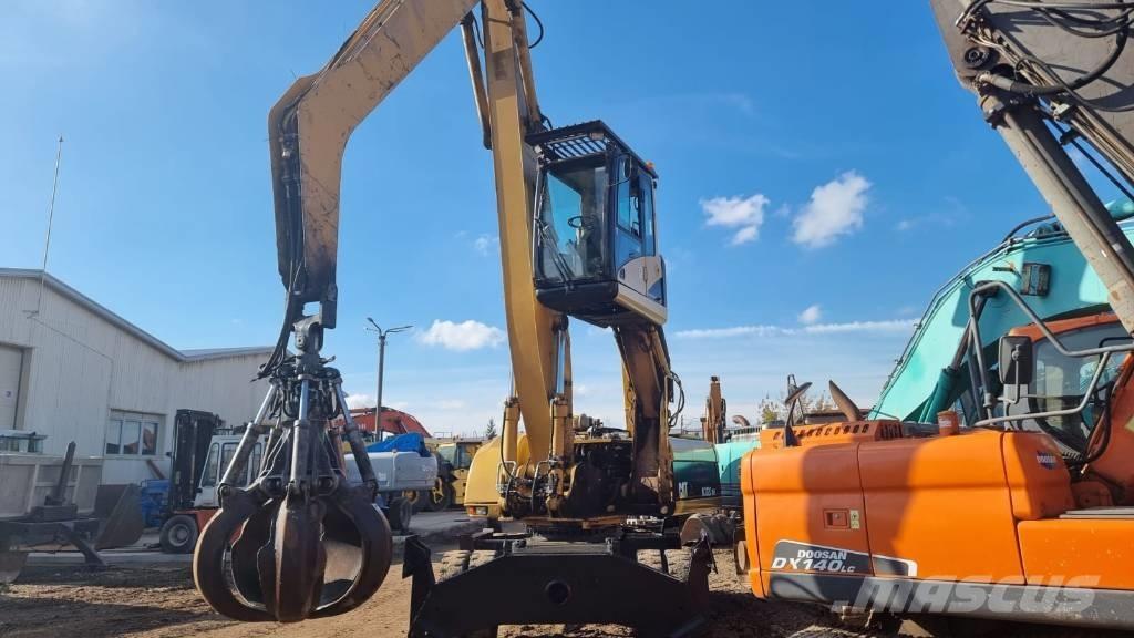 CAT M 322 C MH مناولات المخلفات / مناولات صناعية