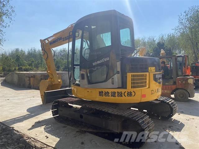 Komatsu pc78us حفارات زحافة