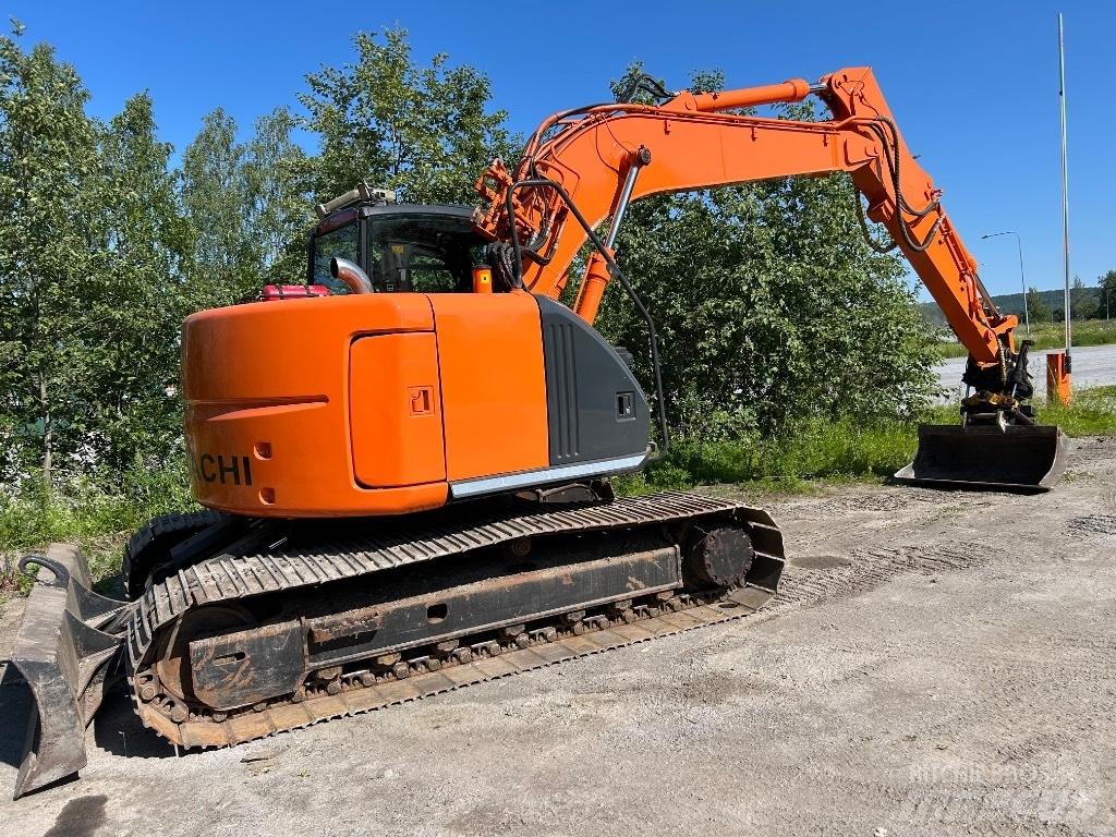 Hitachi ZX 135 US حفارات زحافة