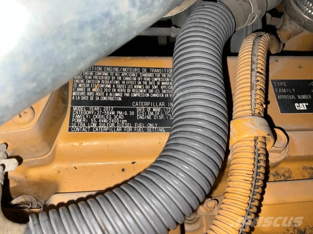 CAT 908 M لوادر بعجل