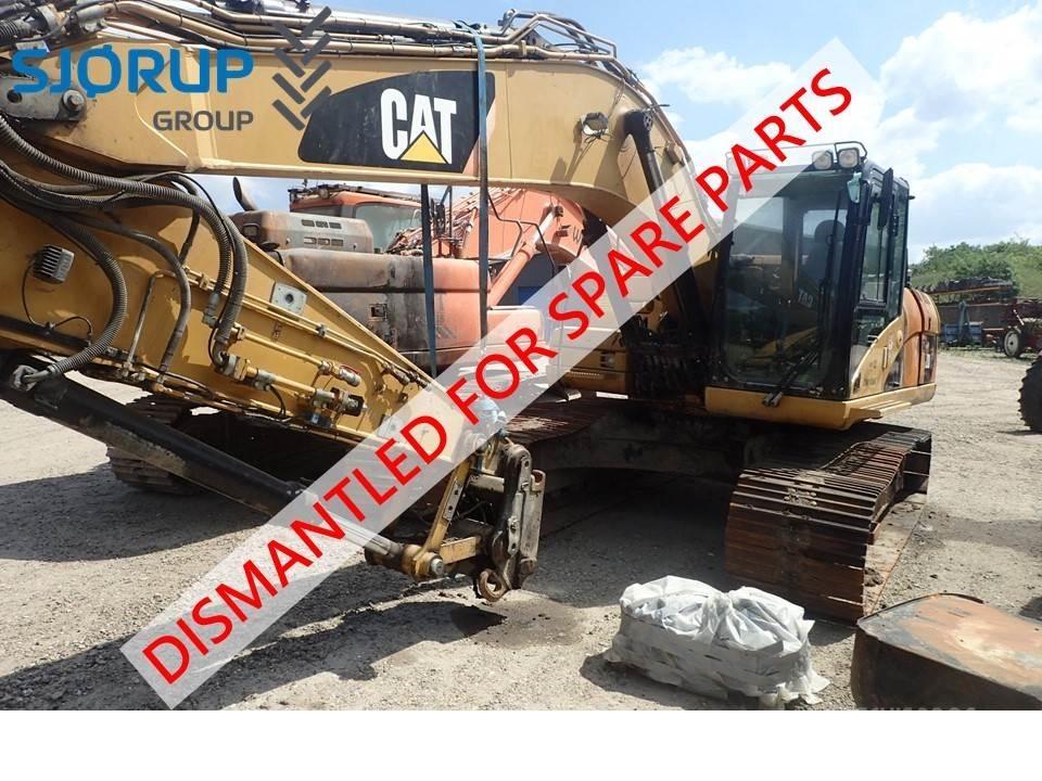 CAT 323D الجرارات