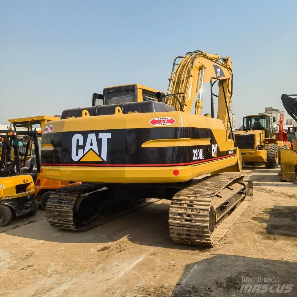 CAT 320 B L حفارات زحافة