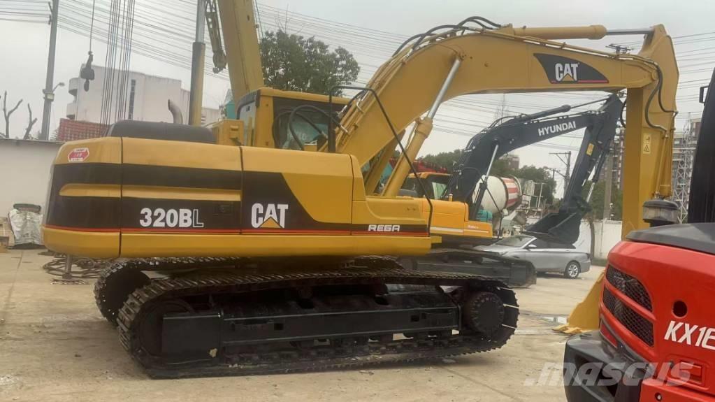 CAT 320 B L حفارات زحافة