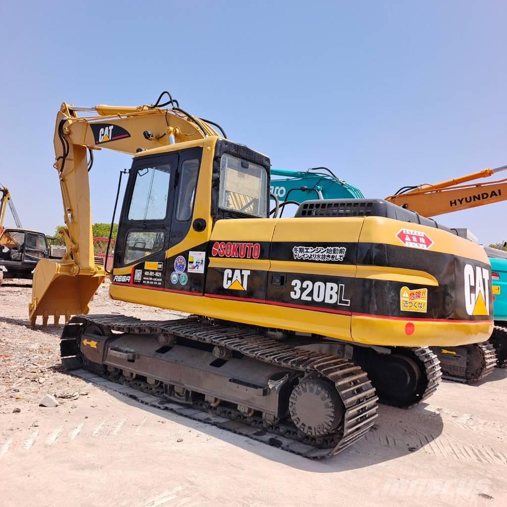 CAT 320 BL حفارات زحافة