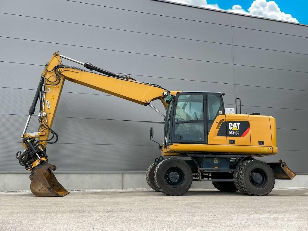 CAT M316F حفارات بعجل