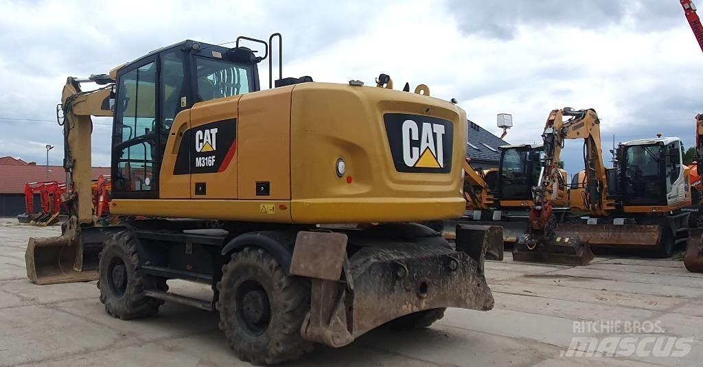 CAT M316F حفارات بعجل