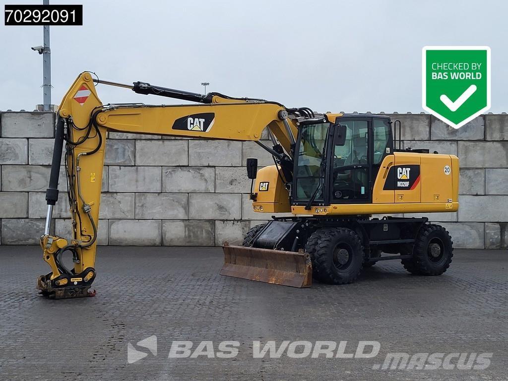 CAT M320 F حفارات بعجل