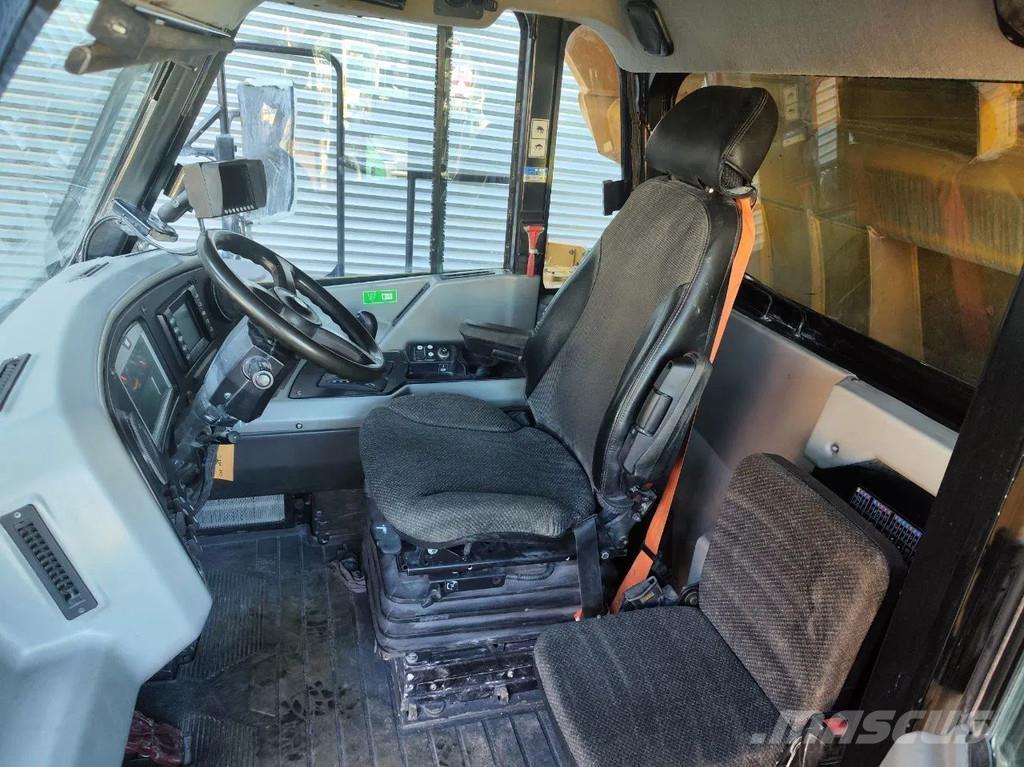 CAT 772G شاحنات المخلفات الصلبة