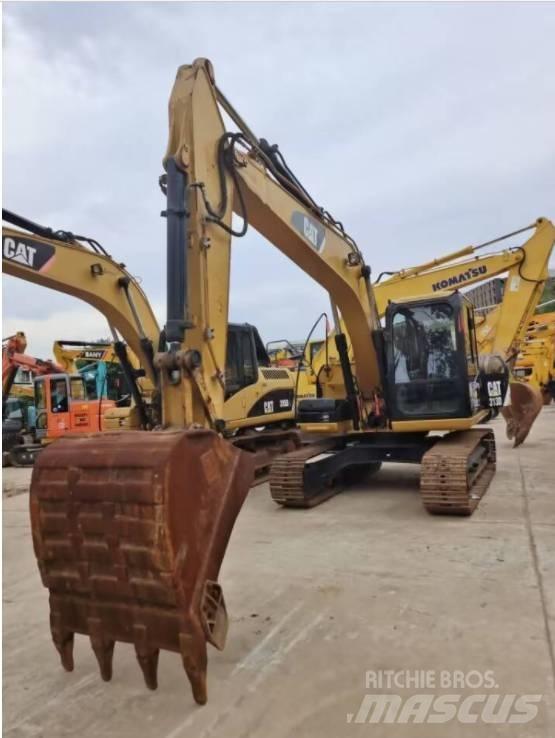 CAT 313 D حفارات زحافة