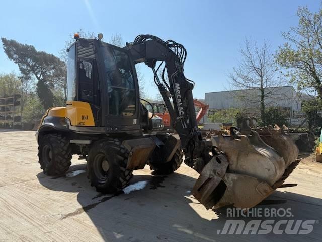 Mecalac 12 M TX حفارات بعجل