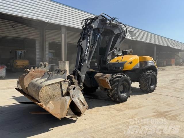 Mecalac 12 M TX حفارات بعجل