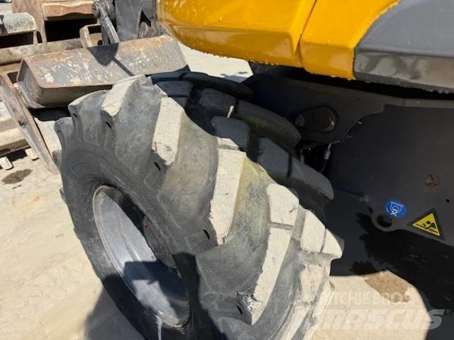 Mecalac 12 M TX حفارات بعجل