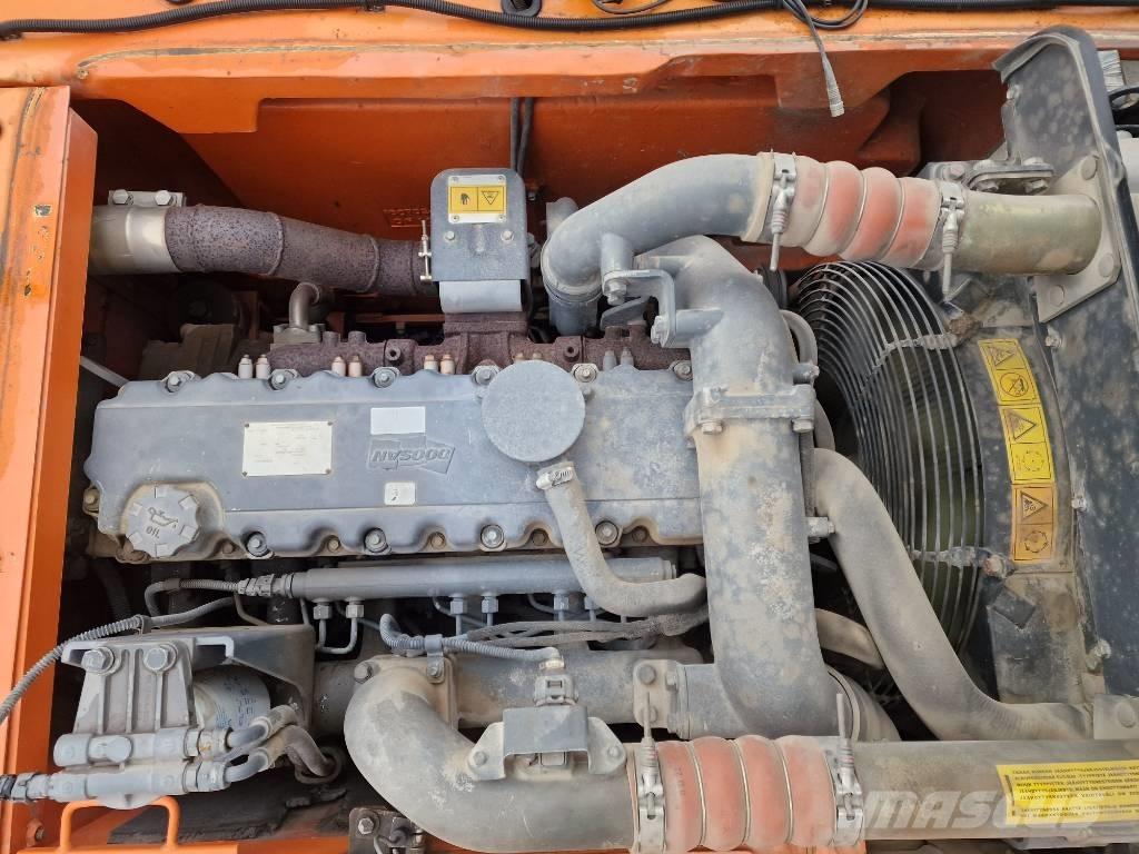 Doosan DX 160 W حفارات بعجل