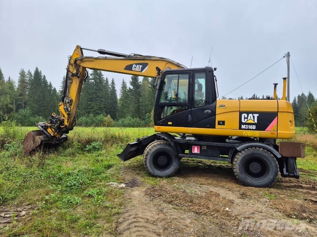 CAT M 316 D حفارات بعجل