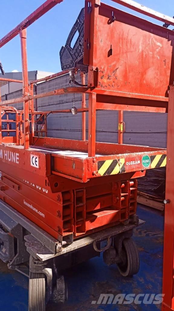 JLG 3246 ES رافعات مقصية الشكل