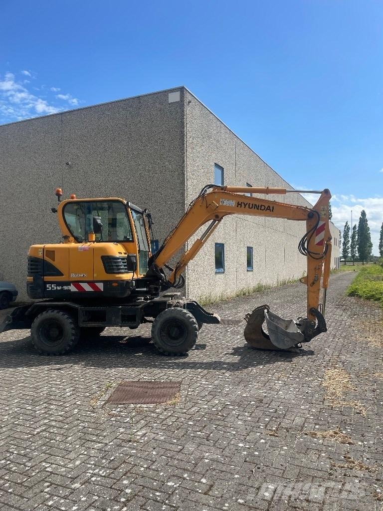 Hyundai 55w9a حفارات بعجل