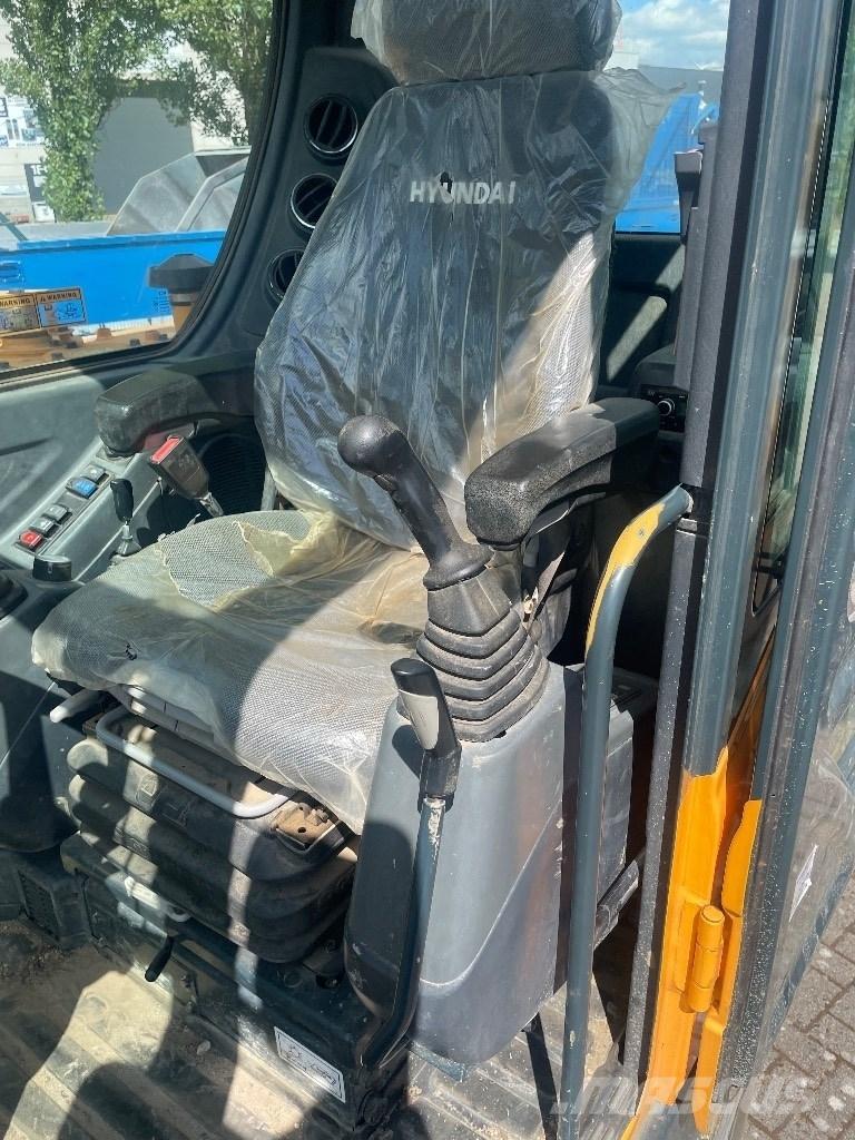 Hyundai 55w9a حفارات بعجل