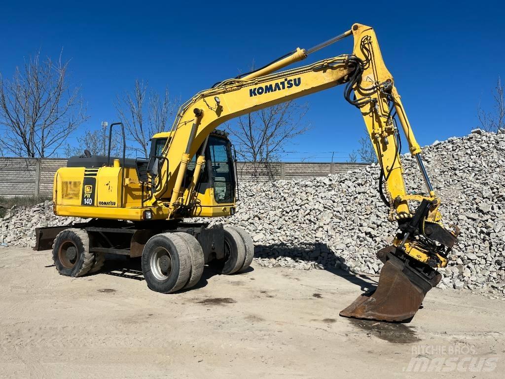 Komatsu PW 140-7 حفارات بعجل