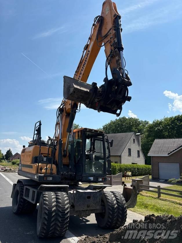 Hyundai HW 140 حفارات بعجل