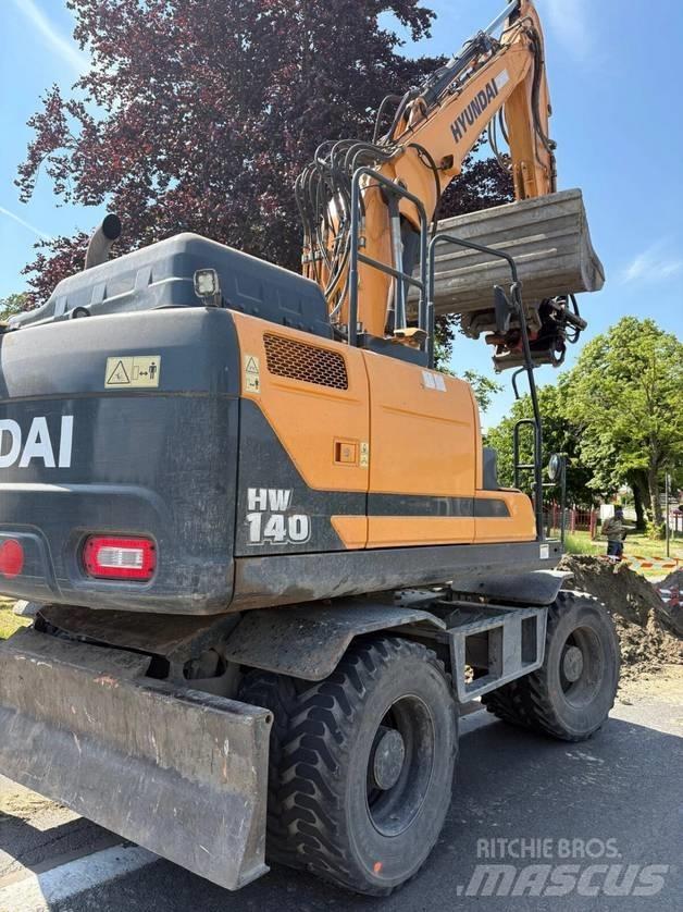 Hyundai HW 140 حفارات بعجل