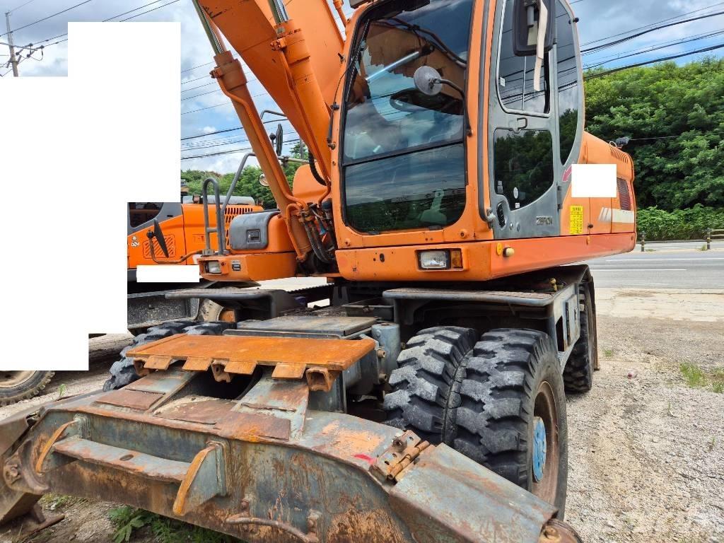 Doosan DX210WA حفارات بعجل
