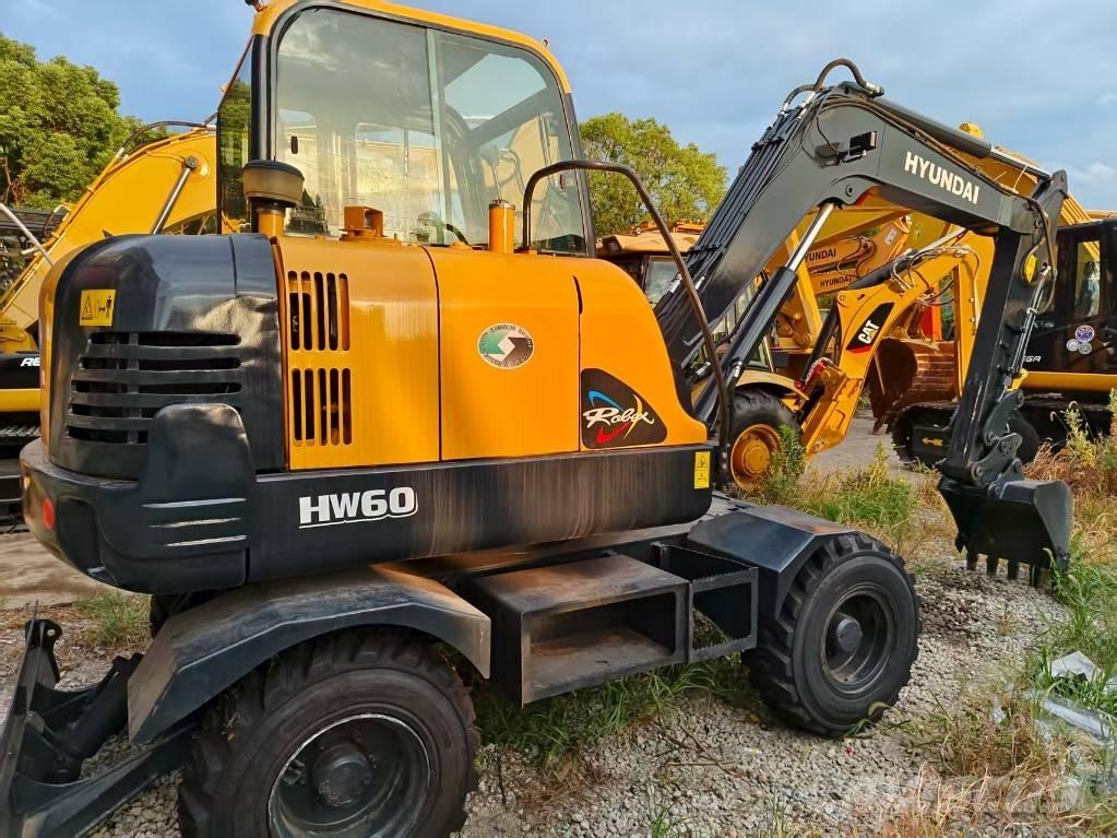 Hyundai 60 W حفارات بعجل