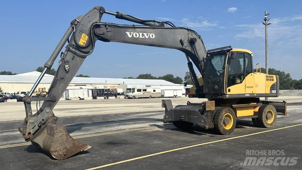Volvo EW 210 C حفارات بعجل