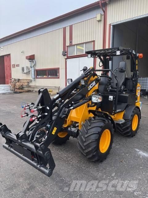 JCB 403 E لوادر انزلاقية التوجيه