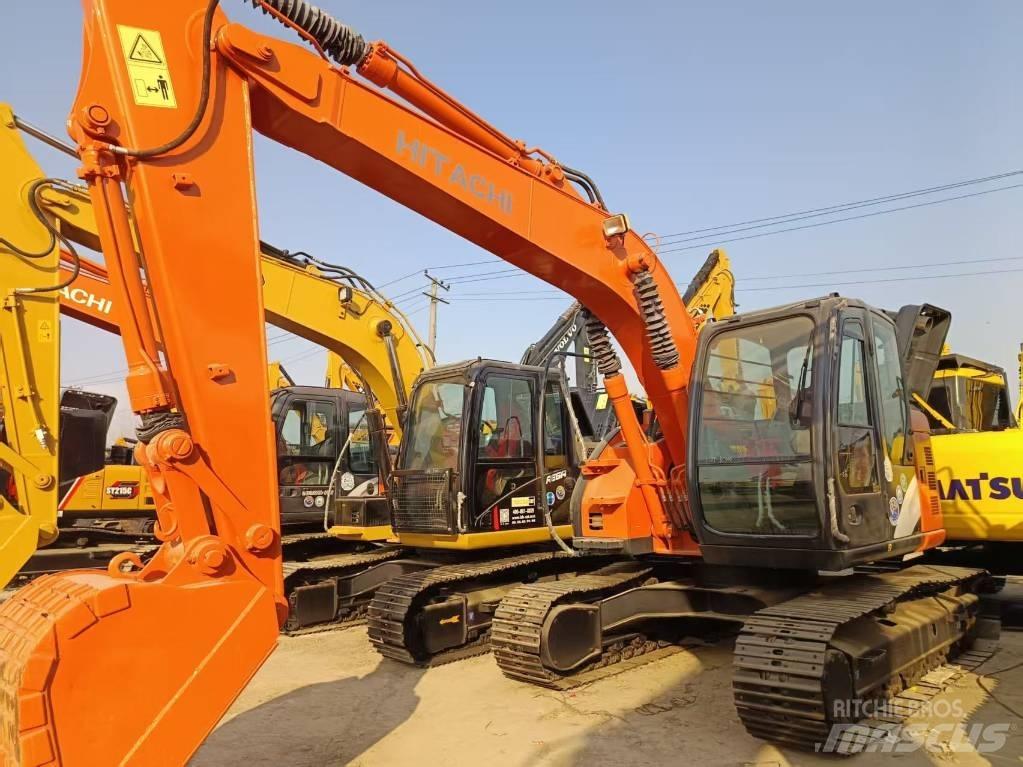 Hitachi ZX135 حفارات زحافة
