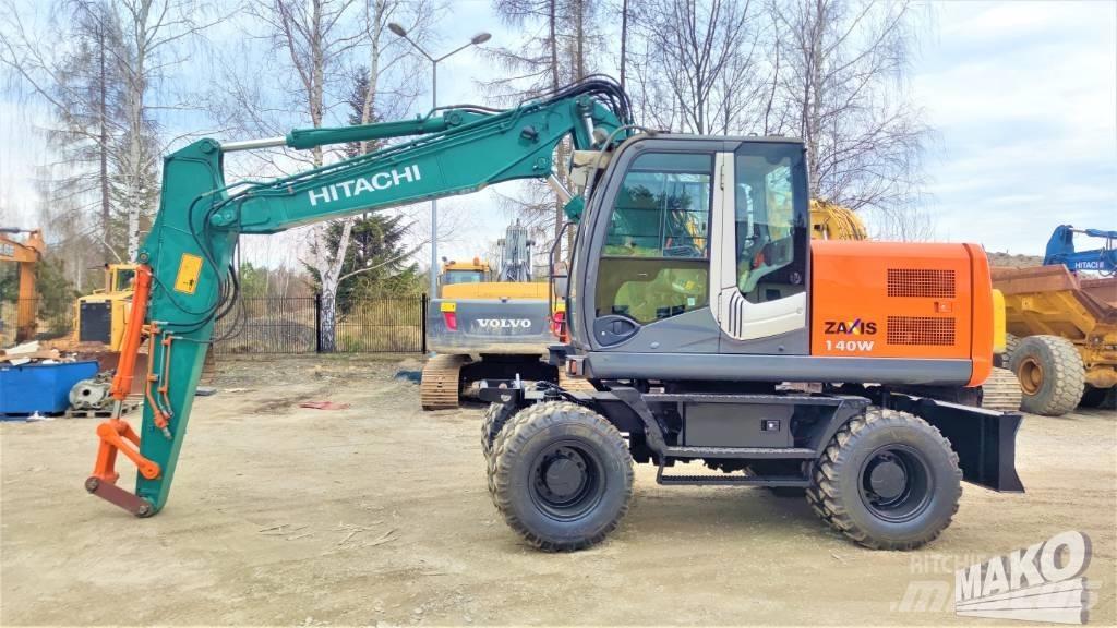 Hitachi ZX 140 W-3 حفارات بعجل