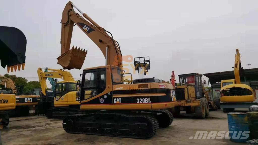 CAT 320 B حفارات زحافة