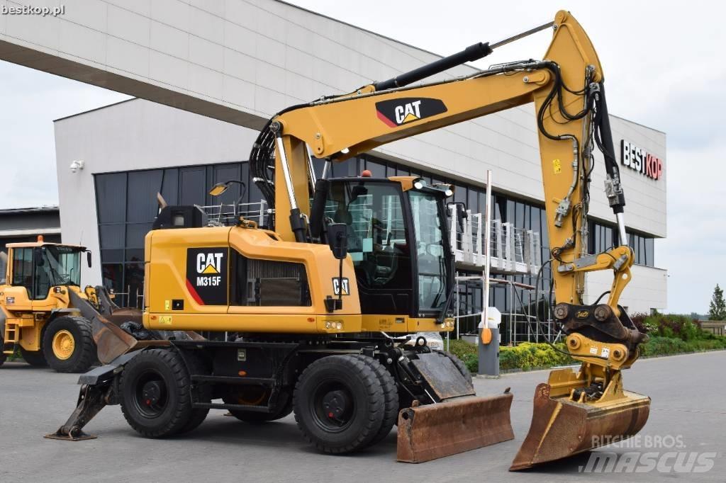 CAT M 315 F حفارات بعجل