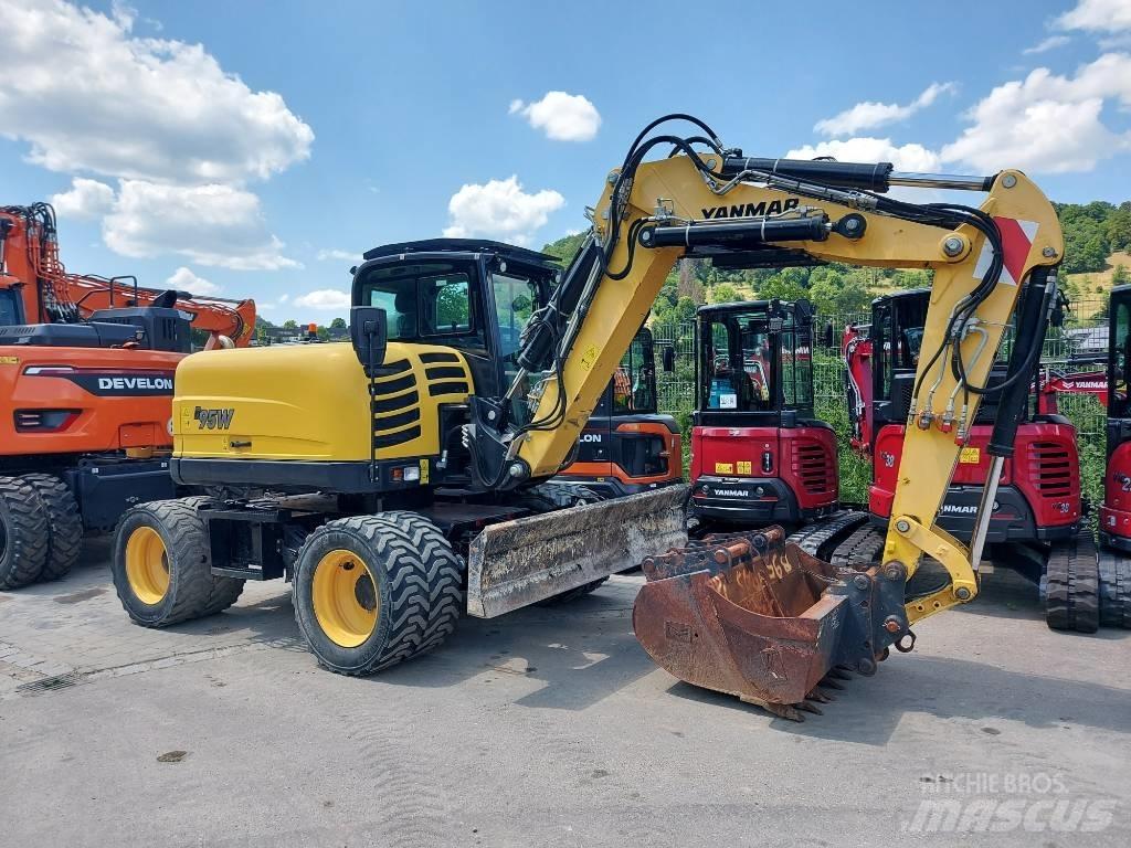 Yanmar B 95 W حفارات بعجل