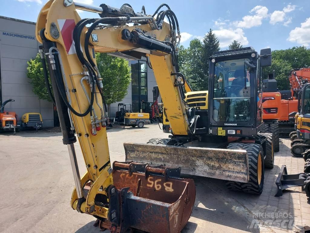 Yanmar B 95 W حفارات بعجل