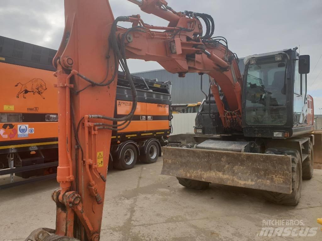 Hitachi ZX140W-6 حفارات بعجل